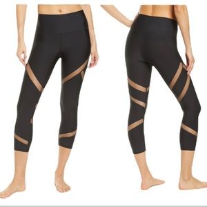 Alo Yoga Mesmerize Mesh Panel Black Capri Leggings